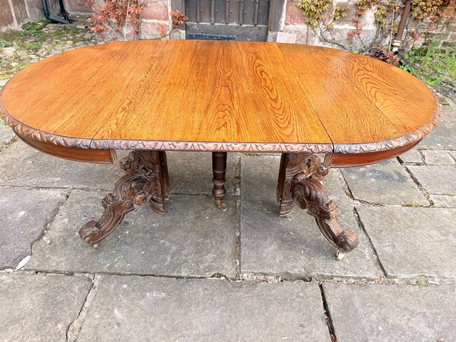 photo furniture Rare French Antique Carved Oak Henri II Extending Split Pedestal Dining Table
