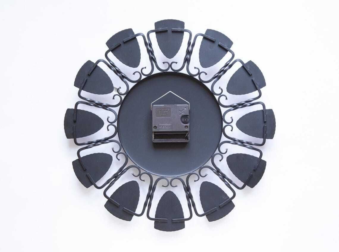 photo furniture 1960s Europa Smeedijzeren Wandklok Mid-Century Atomic Duitsland Modernisme Starburst Junghans Blauw Goud