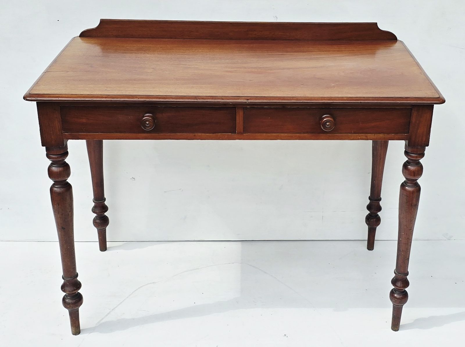 An Antique Mahogany Writing Desk On Turned Legs, 19th C. photo furniture