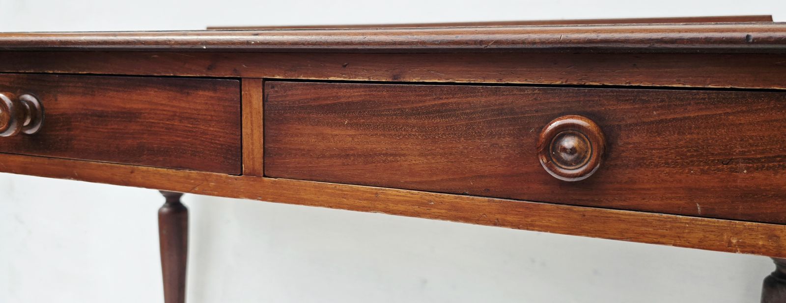 photo for sale An Antique Mahogany Writing Desk On Turned Legs, 19th C.