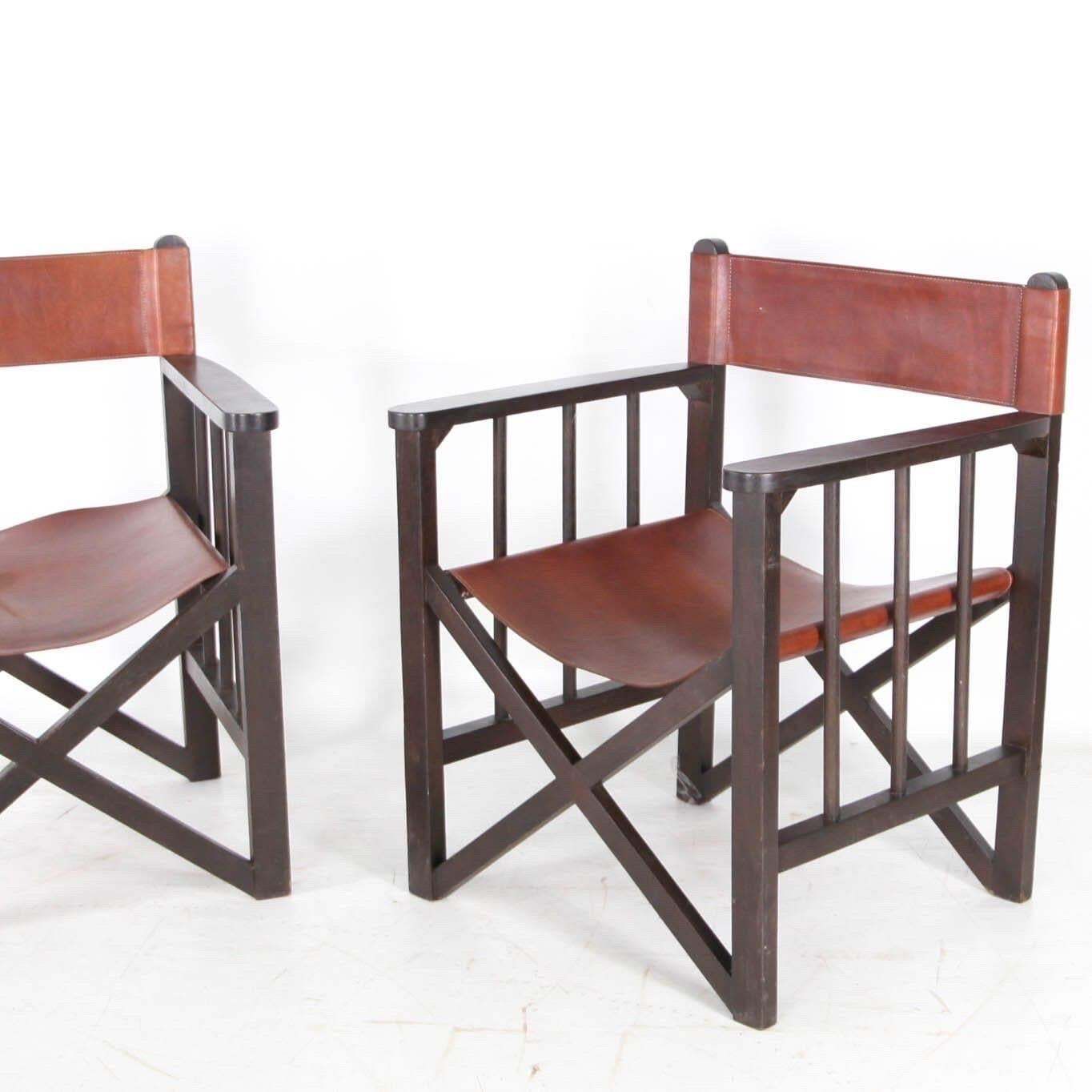 Pair Of Leather And Wood Armchairs photo vinterior