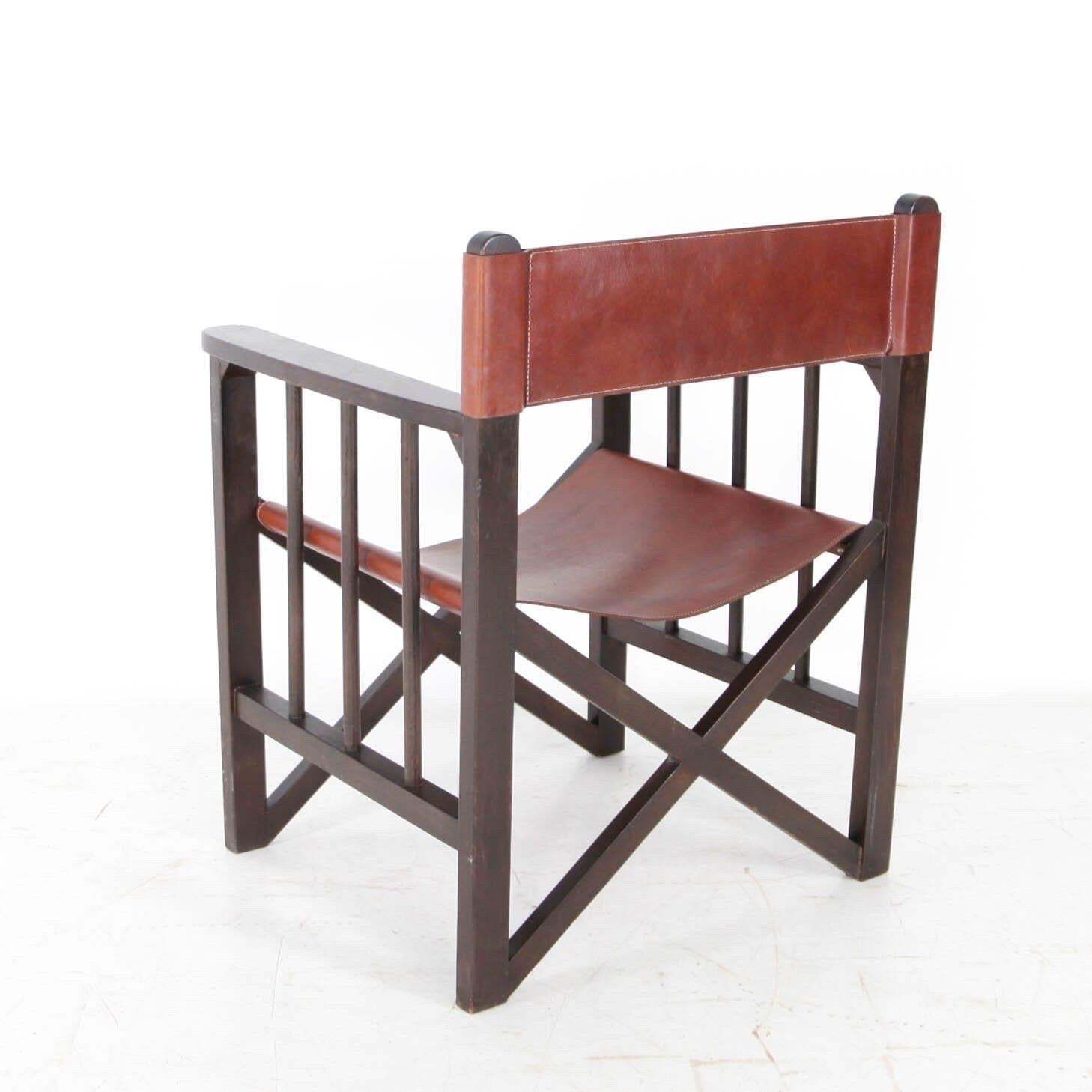 photo vintage Pair Of Leather And Wood Armchairs