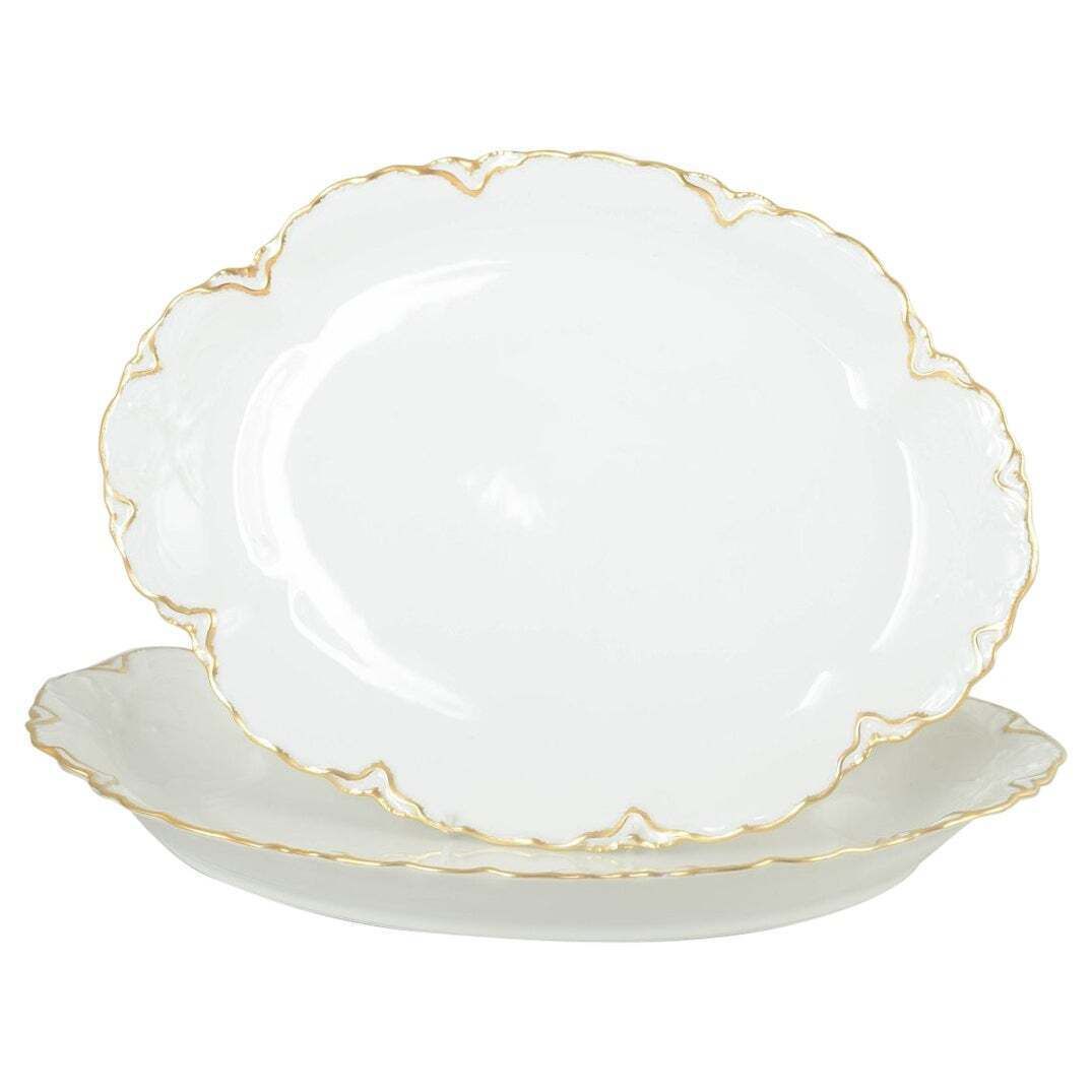 Haviland, France. Pair Of Oval Porcelain Dishes In Cream Tone With Gilded Edges.