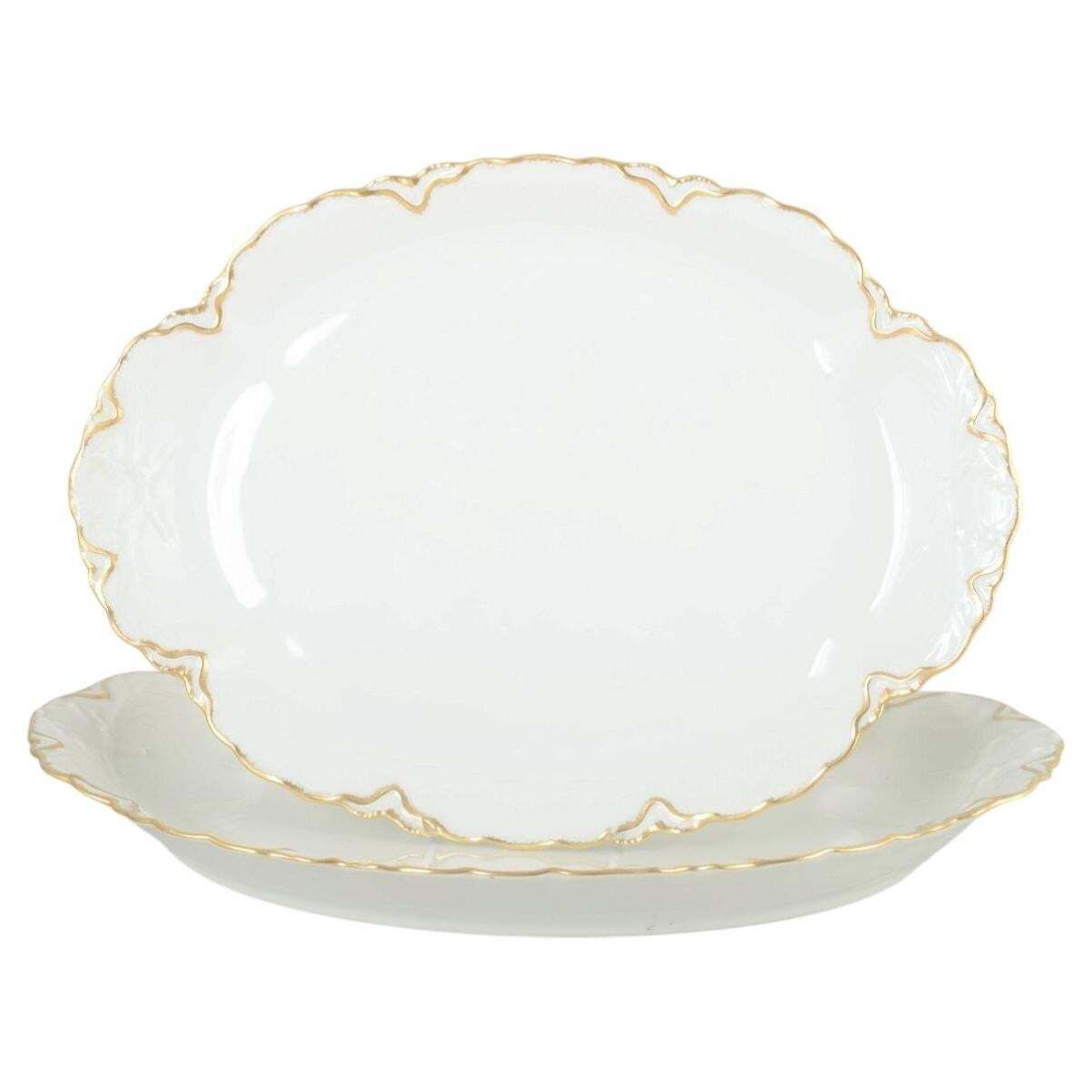 Haviland, France. Pair Of Oval Porcelain Dishes In Cream Tone With Gilded Edges.
