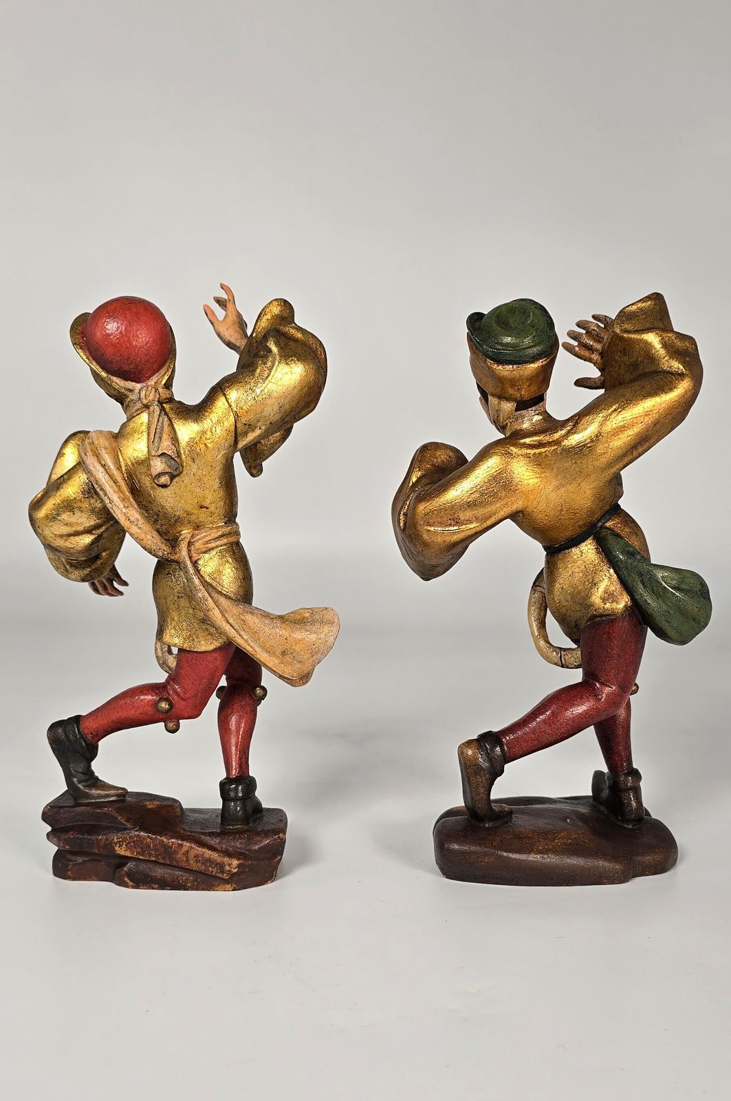 A Pair Of Swiss Or Black Forest Carved And Polychrome And Gilt Painted Jester Figures Circa 1930 photo for sale