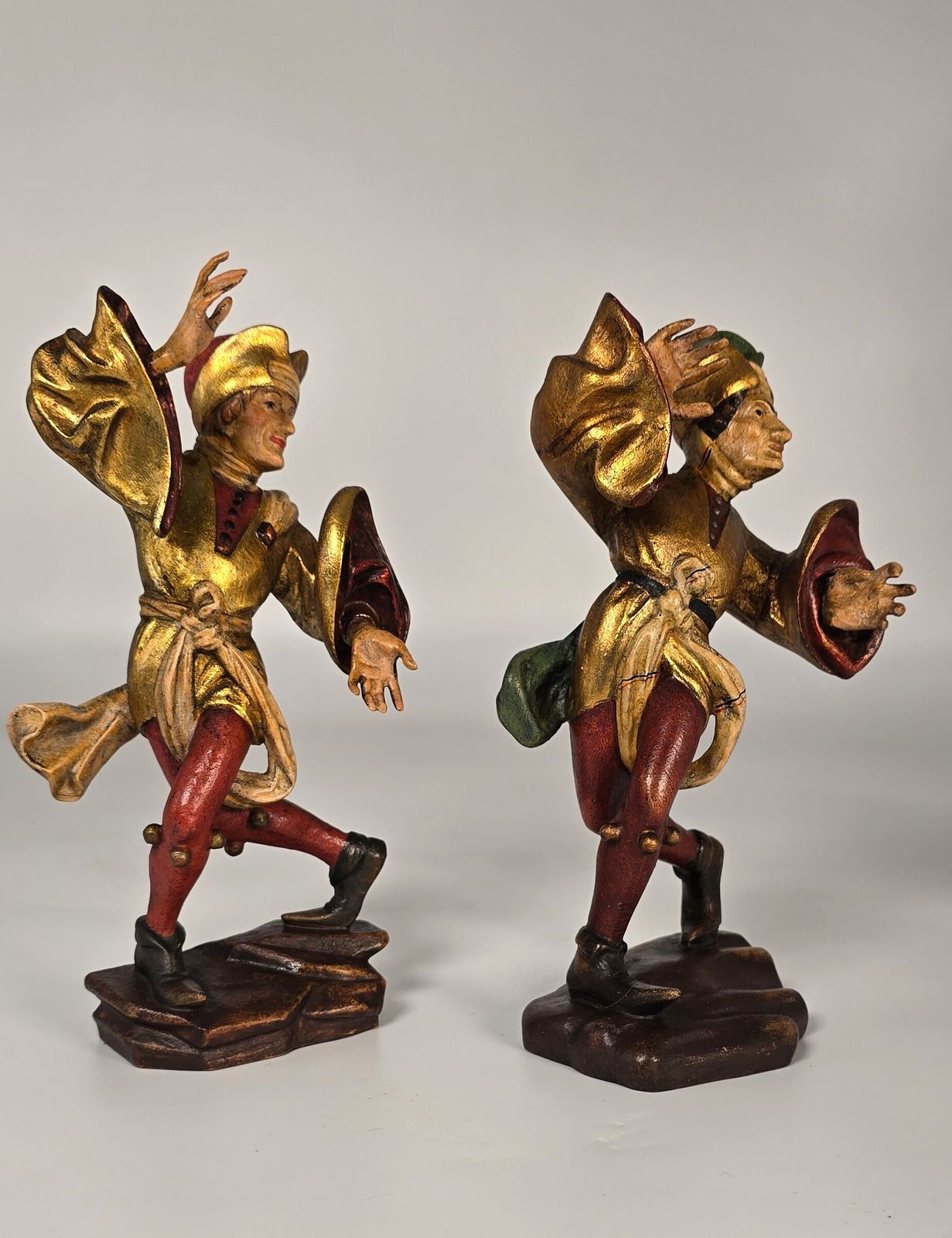 A Pair Of Swiss Or Black Forest Carved And Polychrome And Gilt Painted Jester Figures Circa 1930 photo buy