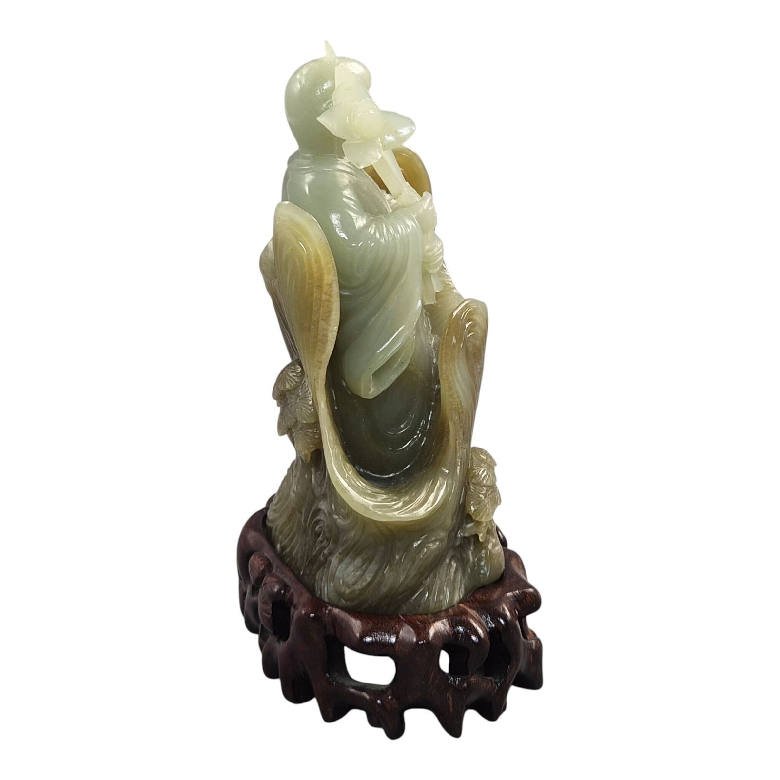 Groot Chinees gesneden jadeïet lotusbeeldje op bijpassende houten standaard photo vinterior