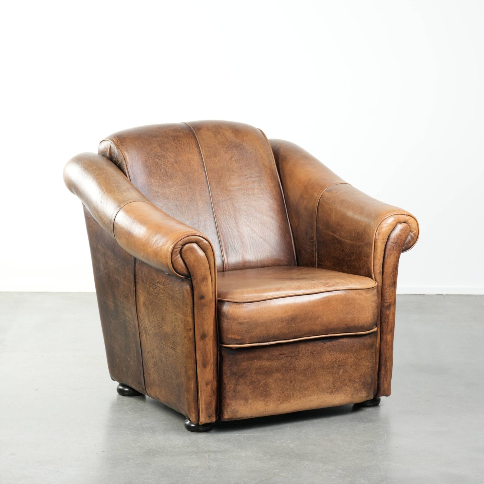 Beautifully Designed And Comfortable Sheepskin Armchair With A Timeless Look And A Finish With Matching Piping.