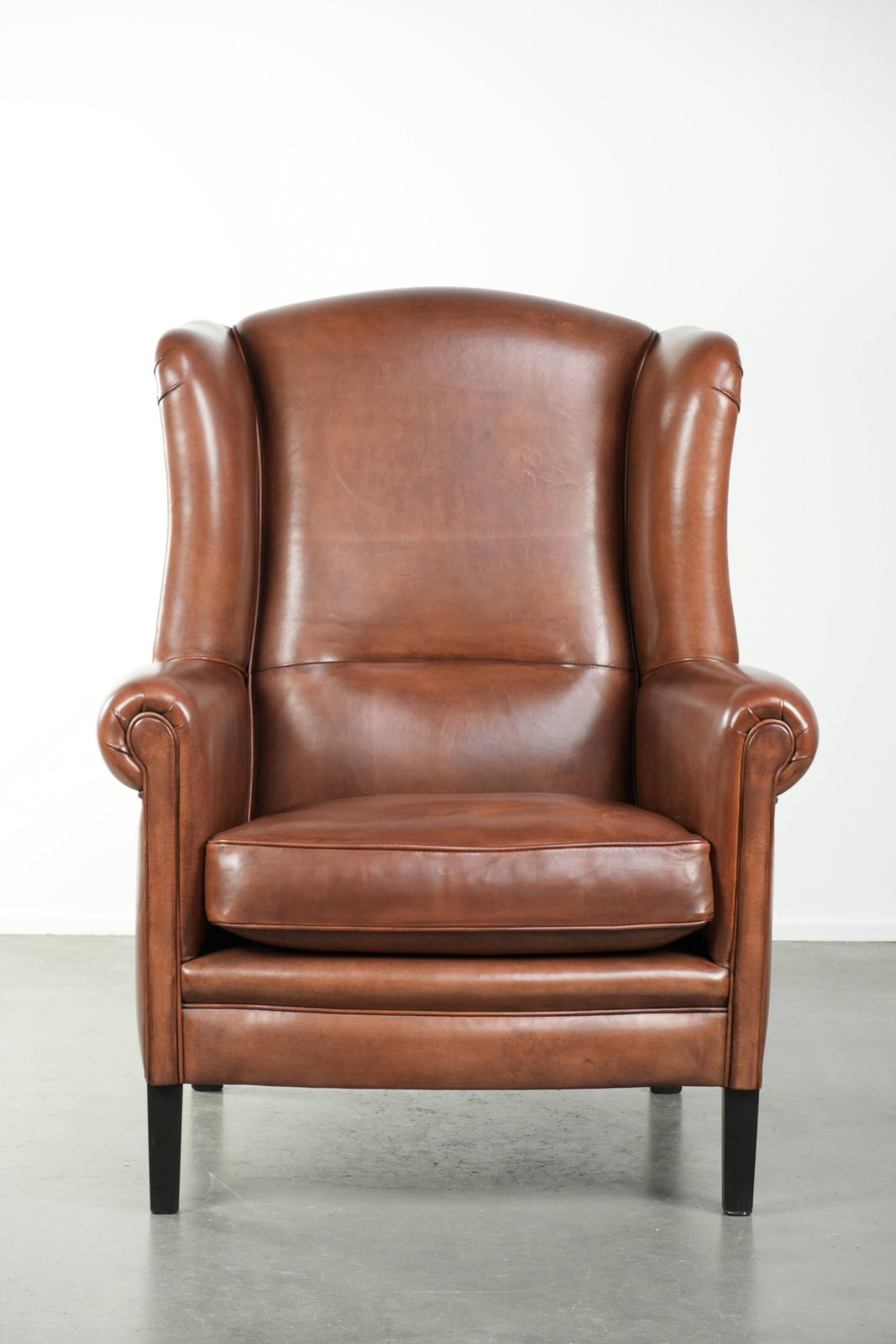 Large Sheepskin Wing Armchair In Like New Condition, In Timeless English Style, With Excellent Seating Comfort. photo furniture