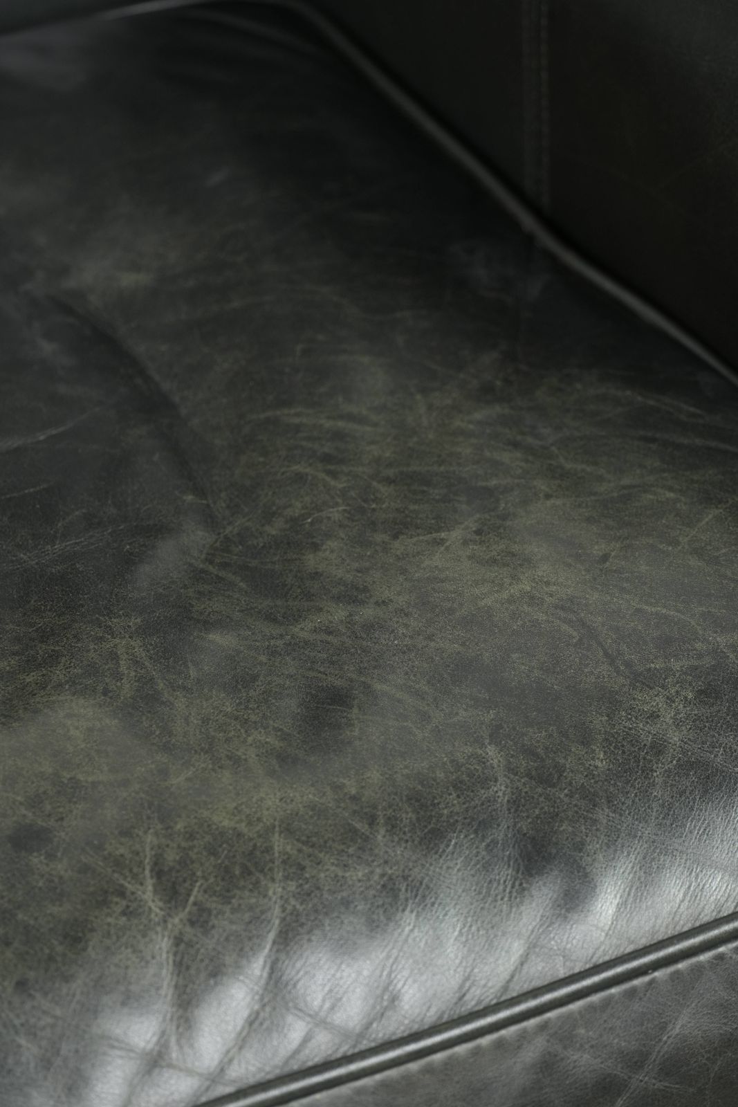 Furniture Black Cowhide Wing Armchair In A Classic English Style, Finished With Decorative Nails. photo
