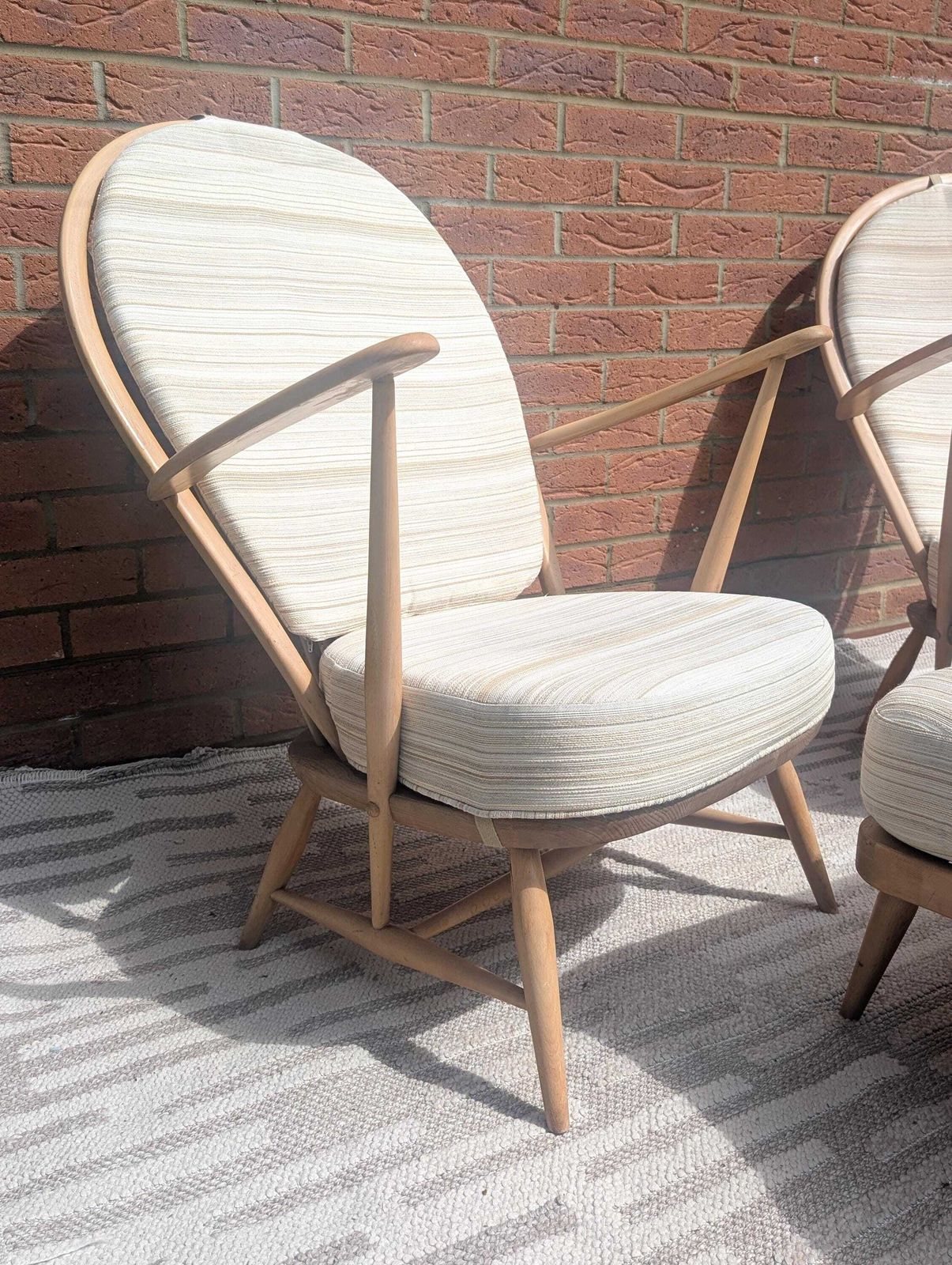 Pair Of Ercol 317 Grandfather Armchairs In Blonde Finish With Matching Footstool Including Original Cushions And Covers By Lucian Ercolani. photo Furniture