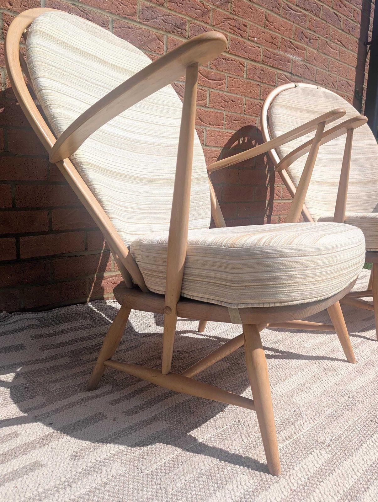 850.0 Pair Of Ercol 317 Grandfather Armchairs In Blonde Finish With Matching Footstool Including Original Cushions And Covers By Lucian Ercolani. photo