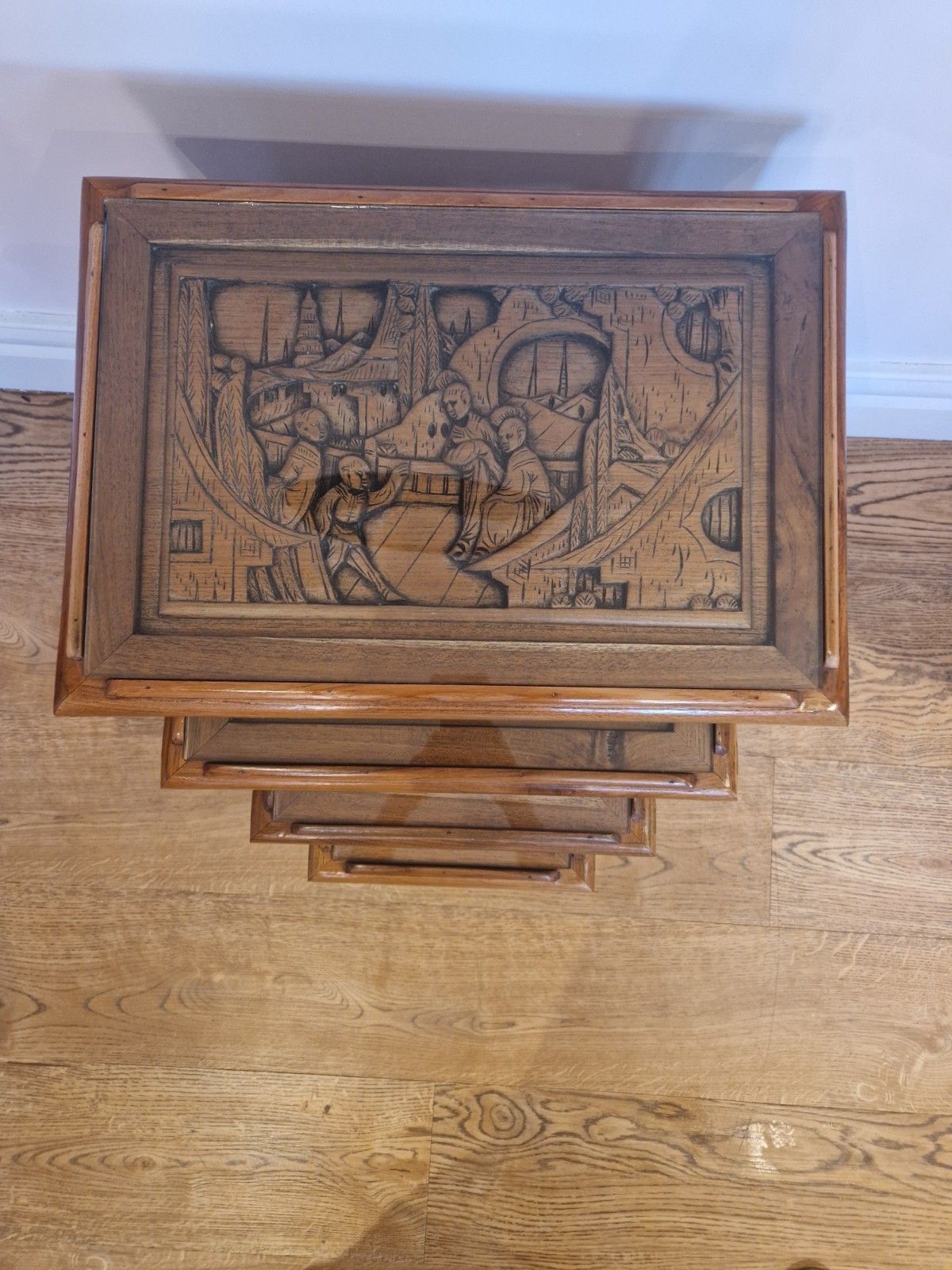 photo furniture Vintage Chinese Camphor Wood Nest Of 4 Tables | Hand Carved Solid Wood