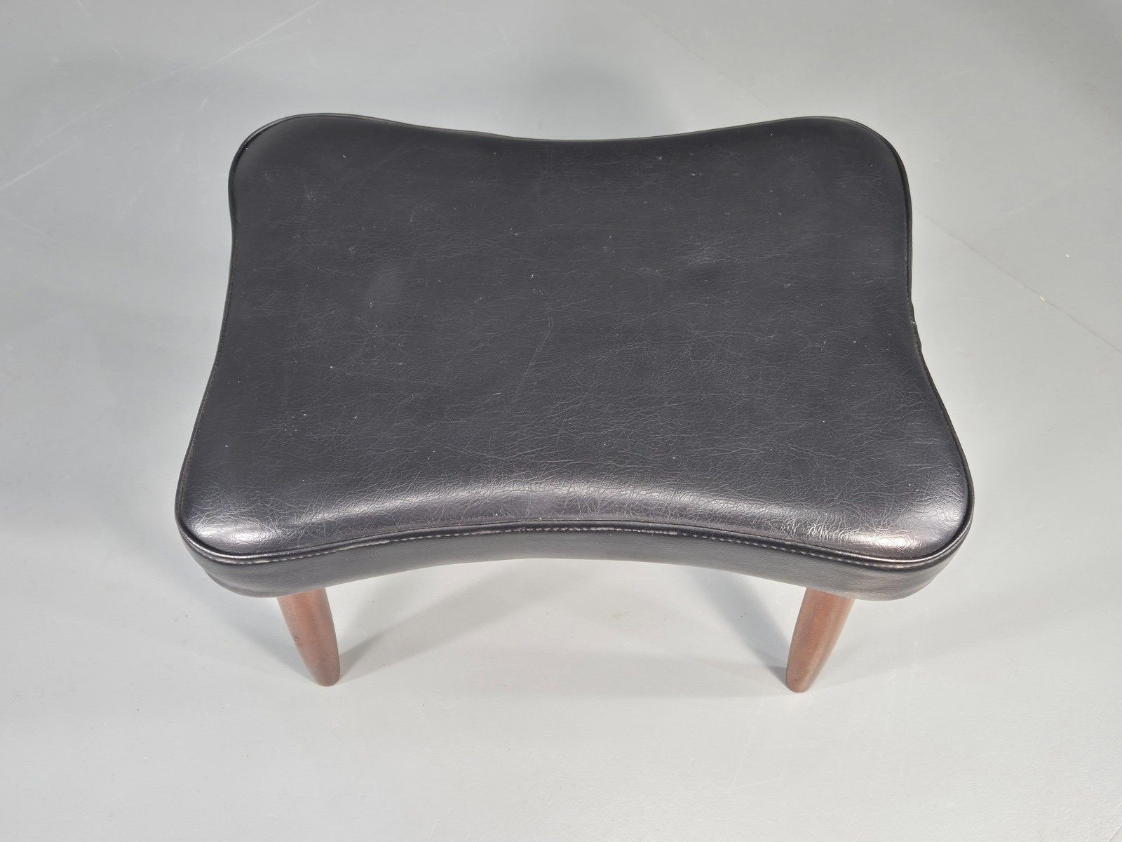 photo furniture Vintage Mid Century Danish Footstool Black Vinyl Teak Legs 1960s Retro Eb12025
