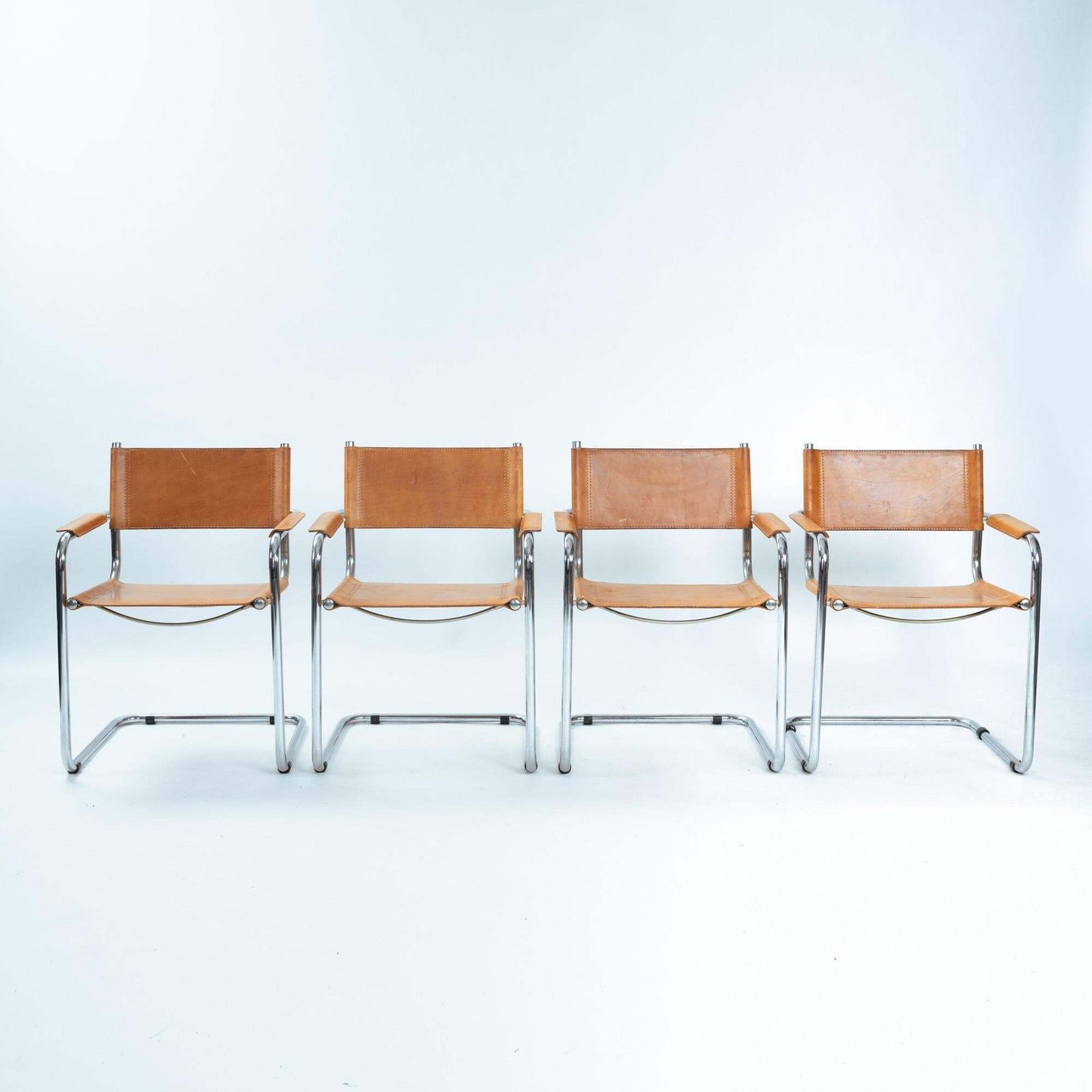 4 Cognac Saddle Leather Cantilever Bauhaus S 34 B 34 Chairs, 1970s photo furniture