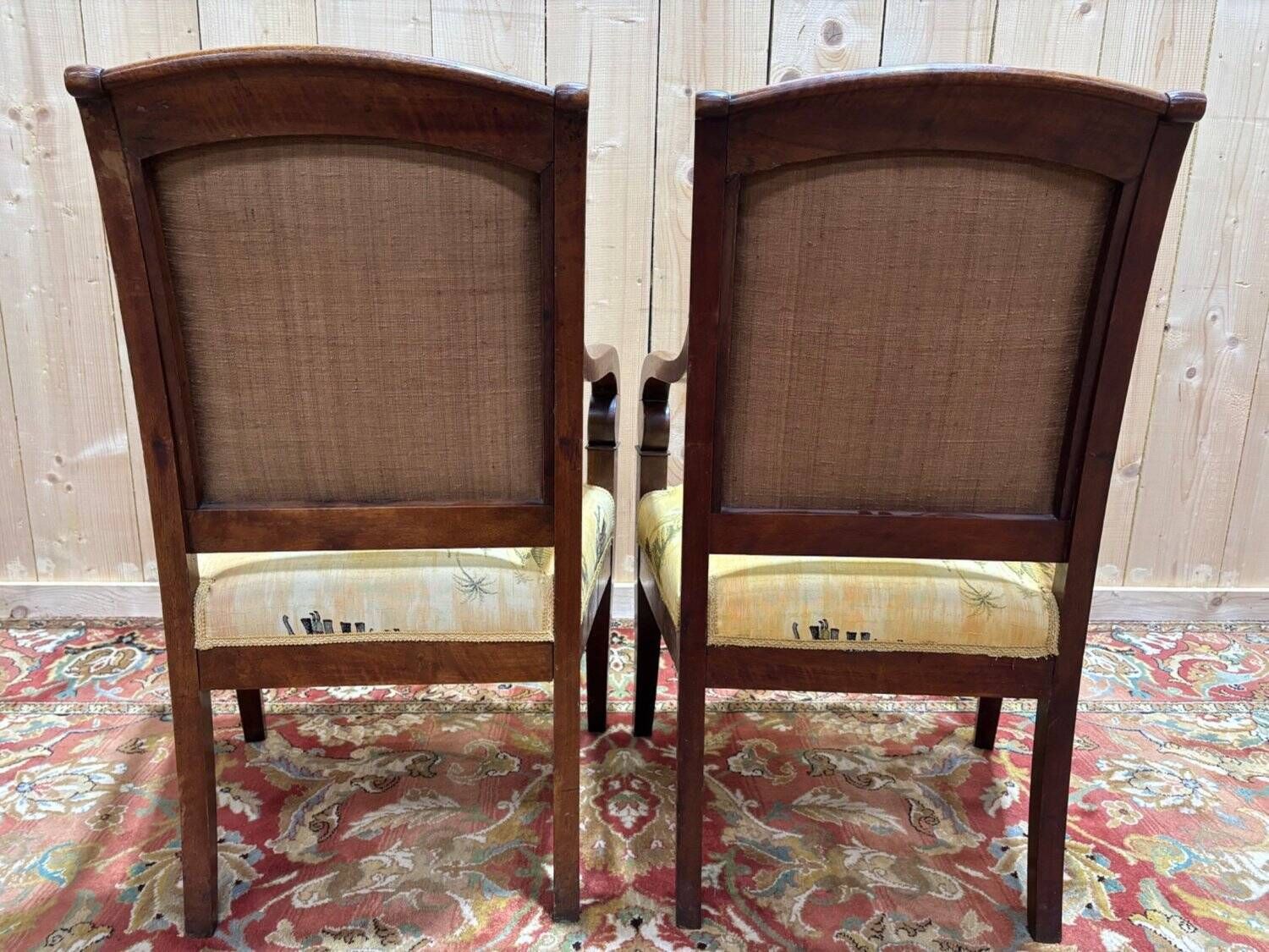 photo furniture Pair Of 19th Century Armchairs With A Scrolled Back