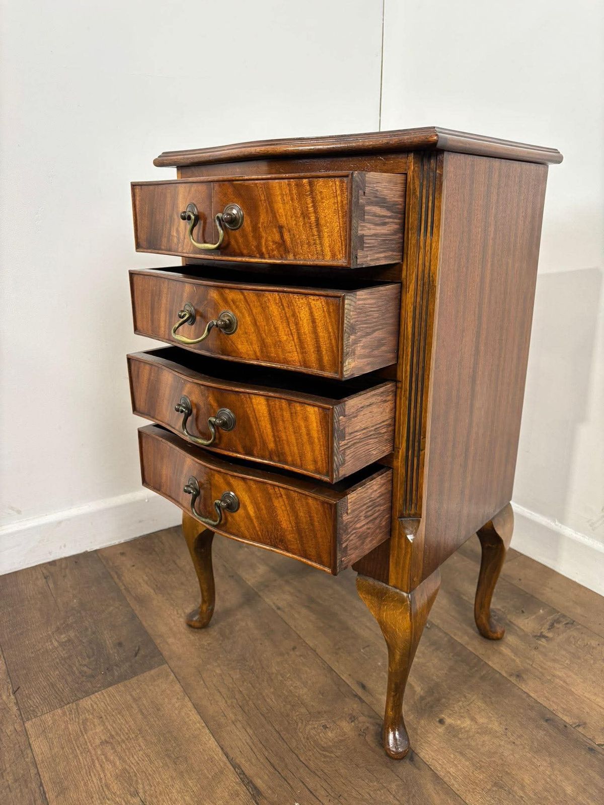 Reproduction Serpentine Front Four Drawer Chest photo 269.0