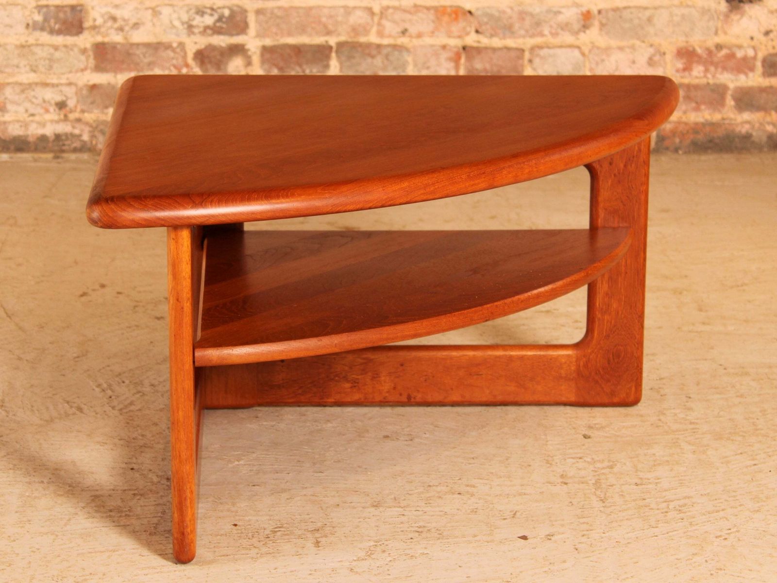 Danish Mid Century Solid Teak Corner / Coffee Table With A Magazine Shelf By S. Burchardt Nielsen, Circa 1970s photo vintage