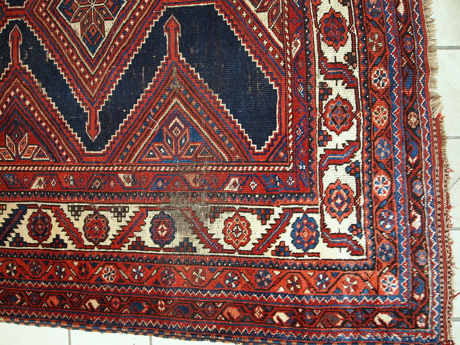 Handmade Antique Distressed Tribal Wool Rug — 4'9" × 11'2" — 1900s photo furniture