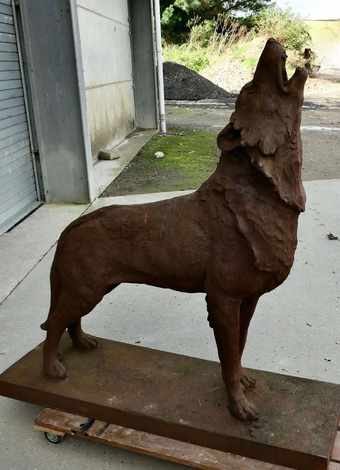 Cast Iron Statue Of A Huge Howling Wolf A Handsome If Terrifying Beast photo furniture
