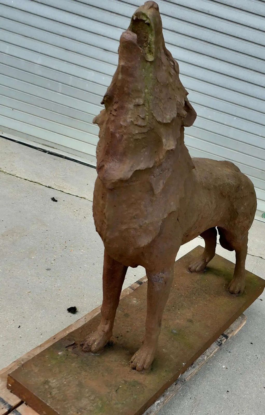 Cast Iron Statue Of A Huge Howling Wolf A Handsome If Terrifying Beast photo for sale