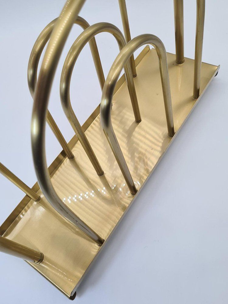 photo furniture Hollywood Regency Style Newspaper Rack In Brass Plated Metal, 1970s