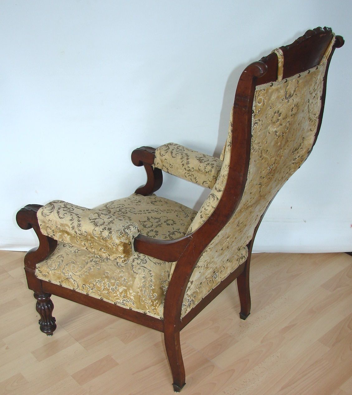 photo furniture An Antique Armchair From The Turn Of The 19th And 20th Centuries, Carved Walnut, Springs