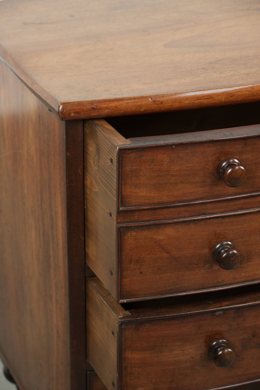 photo for sale Antique 19th Century English Bow Front Chest Of Drawers In A Unique, Subtle Size With Beautiful Warm Colors.