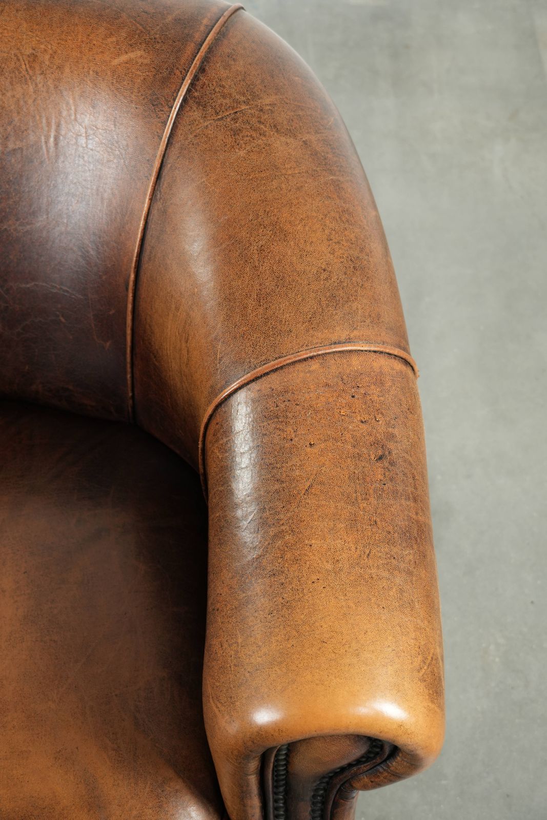 Characterful And Comfortable Club Armchair Made Of Sheepskin With A Fixed Seat Cushion And Excellent Colors photo vintage