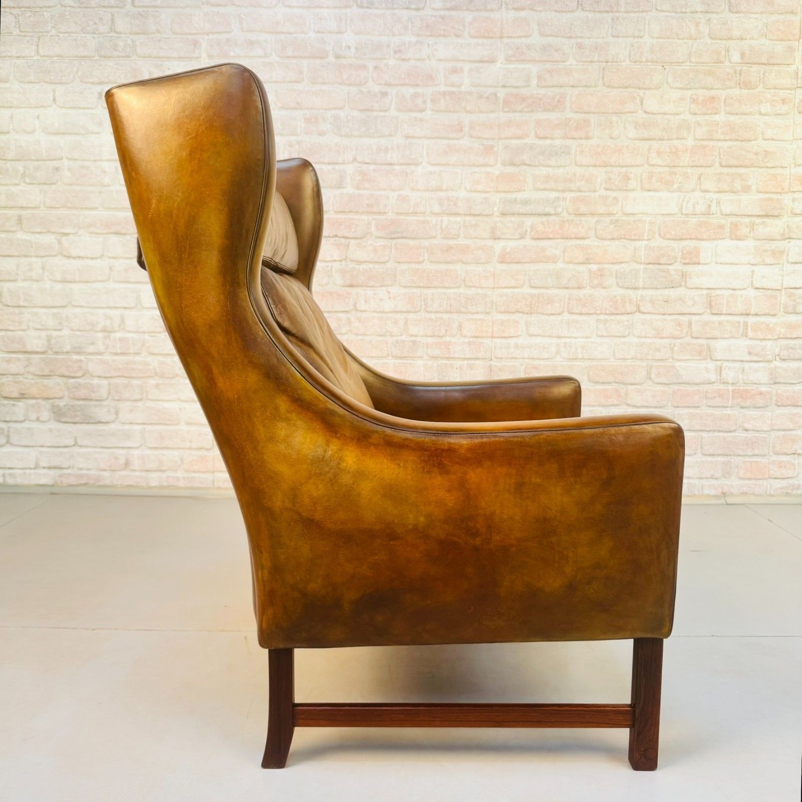 photo furniture Vintage 1960s Fredrik Kayser Wingback Tan Leather Chair For Vatne Møbler