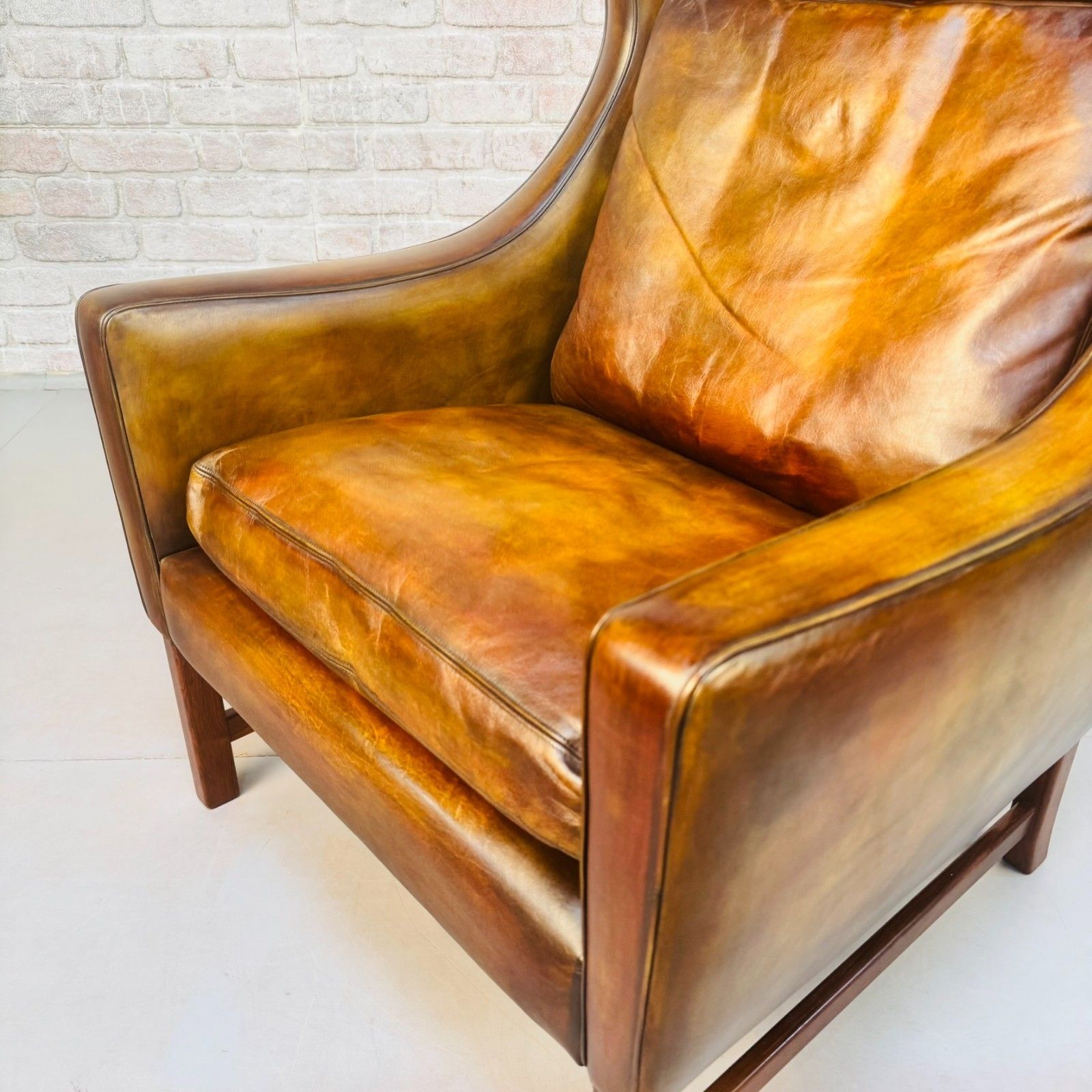photo buy Vintage 1960s Fredrik Kayser Wingback Tan Leather Chair For Vatne Møbler