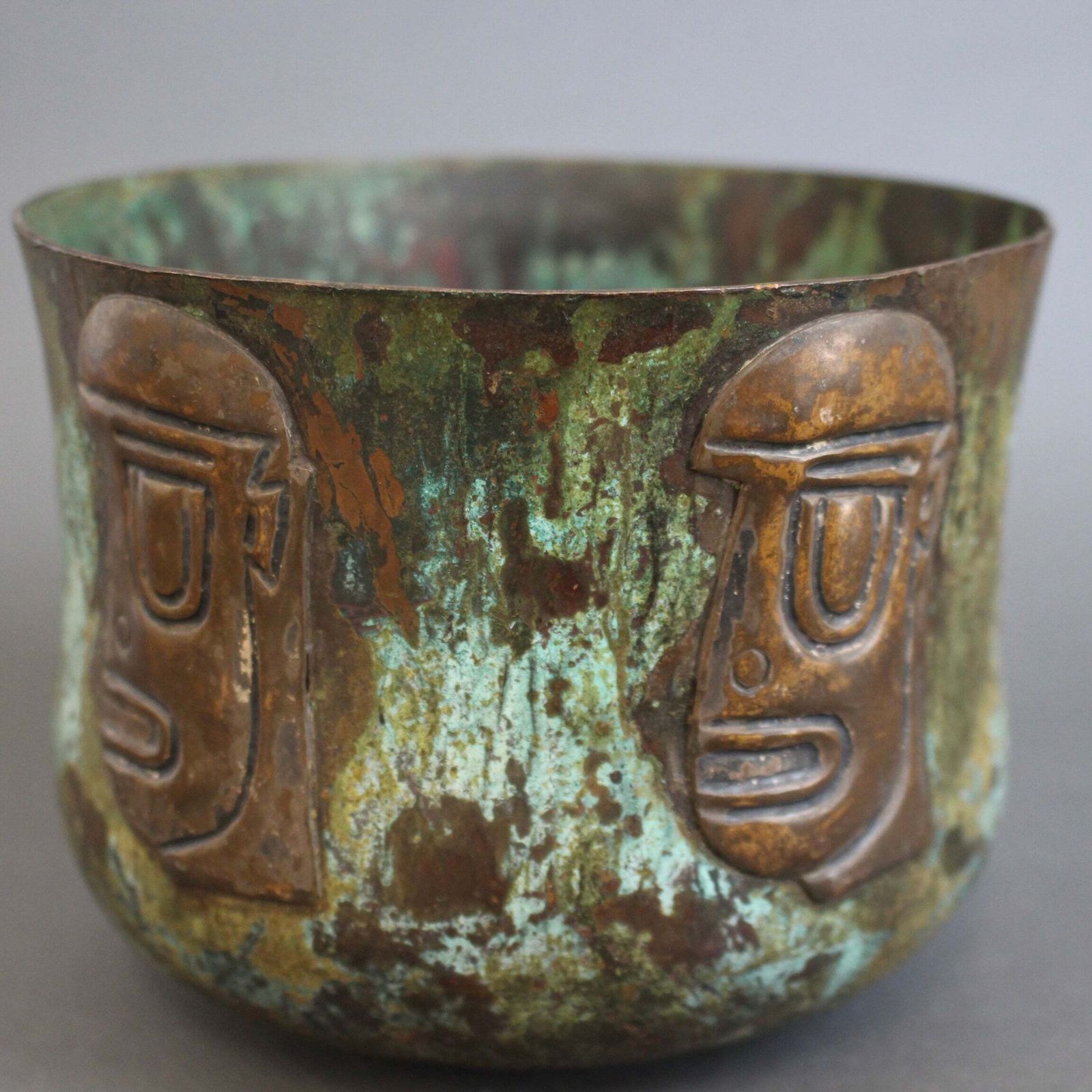 Hammered Copper Cachepot With Ancestral Face Frieze By Graziella Laffi photo vinterior