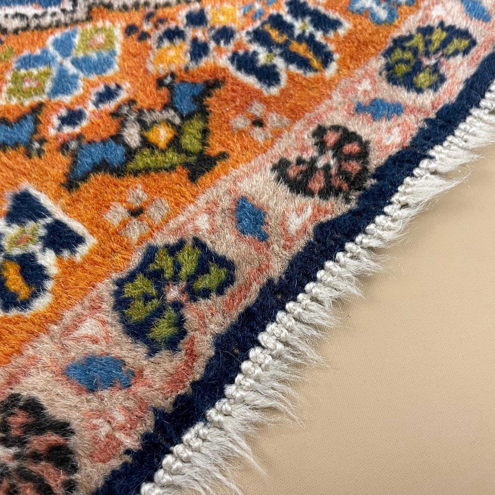 photo furniture Small Accent Rug Wool Middle Eastern Style Decorative Tasselled Orange Blue Detailed Pattern