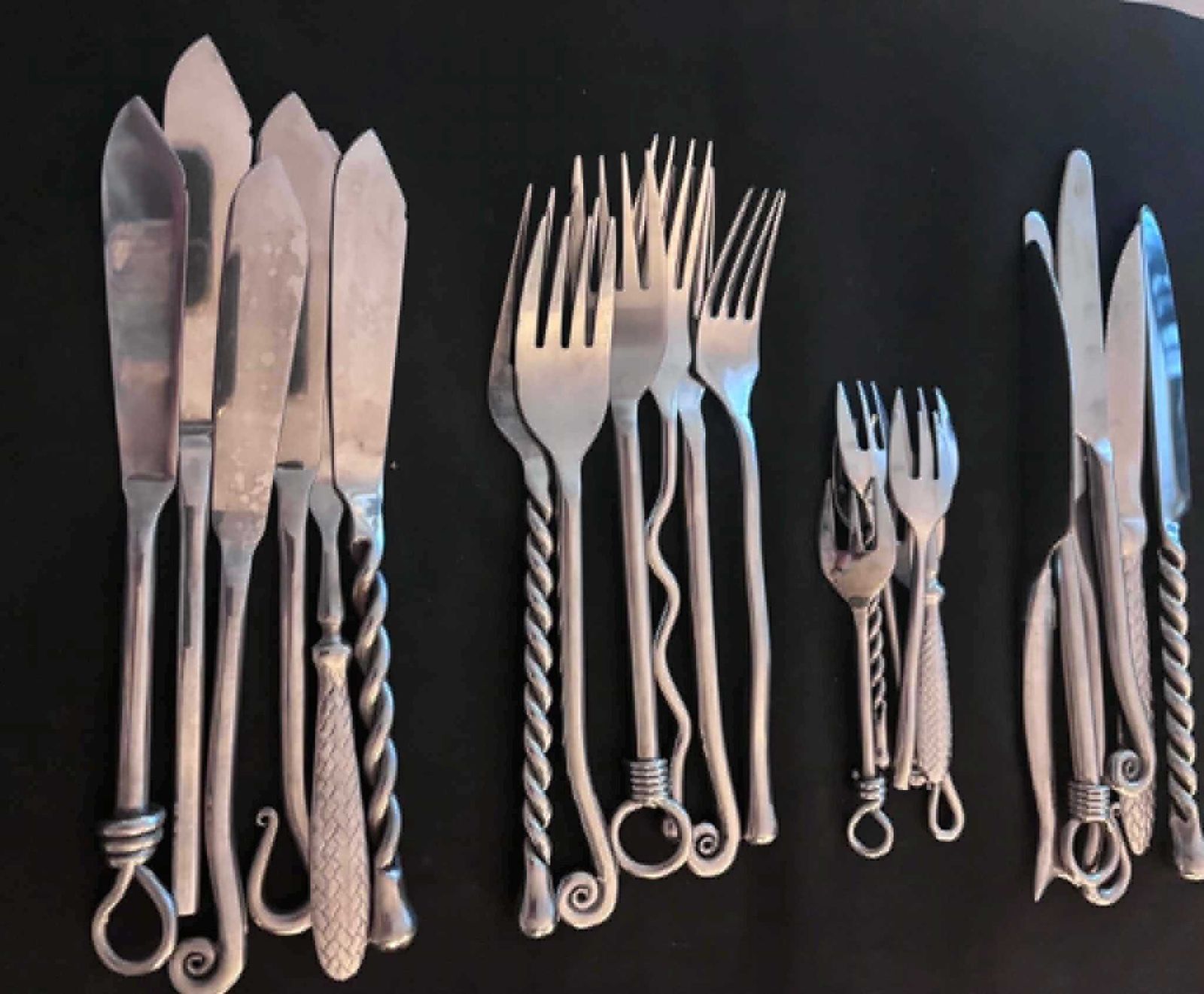 Mismatched French Steel Flatware Set   Twisted Medieval Brutalist Decor photo vintage