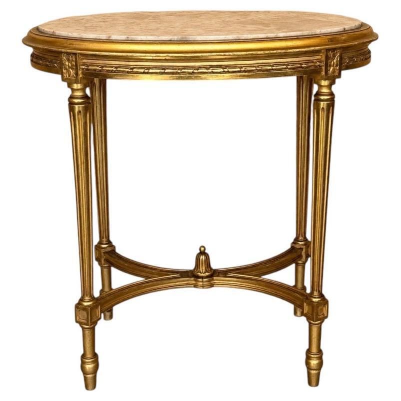 Console ovale d'époque de style Louis XVI dorée à quatre pieds