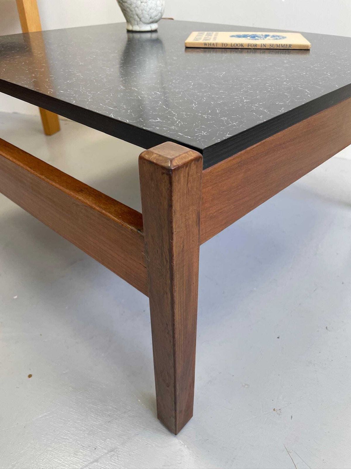 Low Coffee Table Designed By Guy Rogers Black Formica Top And Chunky Modernist Frame photo furniture