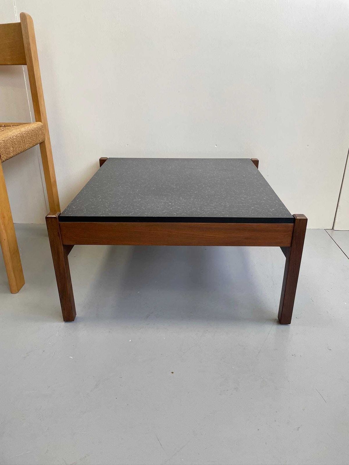 Low Coffee Table Designed By Guy Rogers Black Formica Top And Chunky Modernist Frame photo vinterior