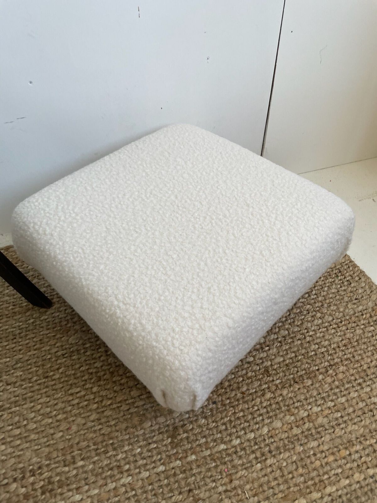 Chunky Low Lying Footstool With Tapered Legs And Cream Boucle Fabric photo furniture