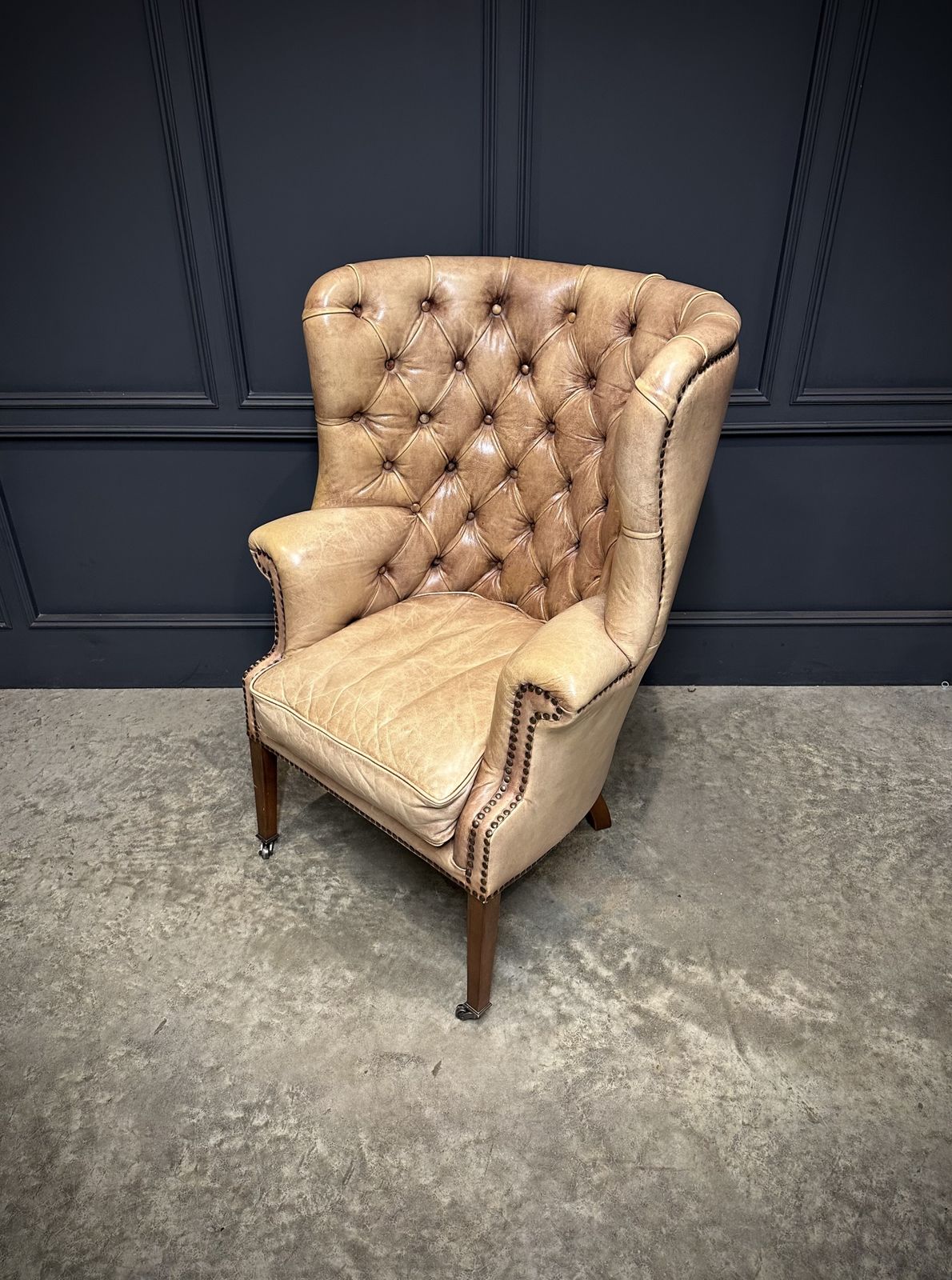Buttoned Leather Porters Wing Chair photo for sale