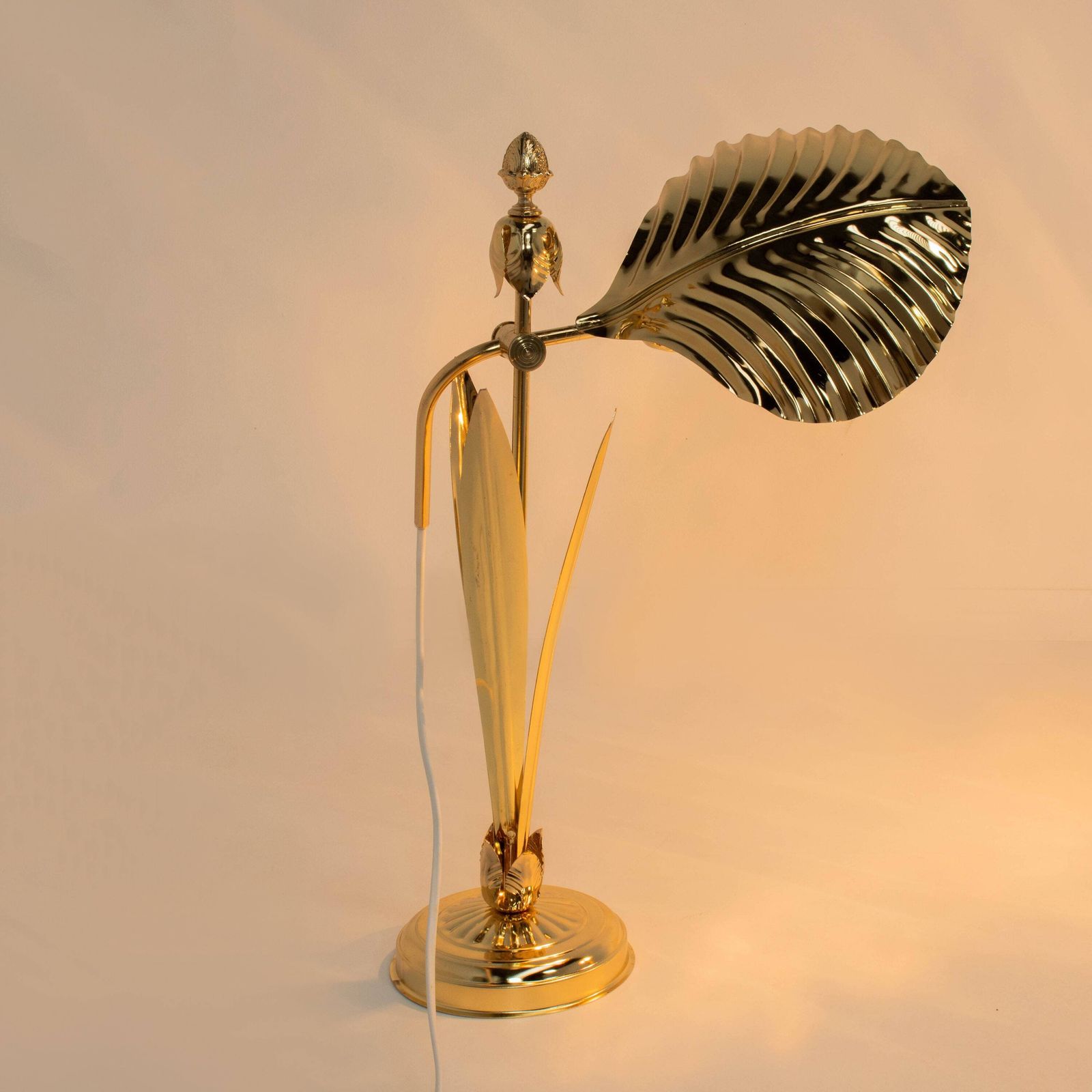 A Set Of Two Gold Mid Century Adjustable Desk Table Lamps From The 80s. photo vinterior