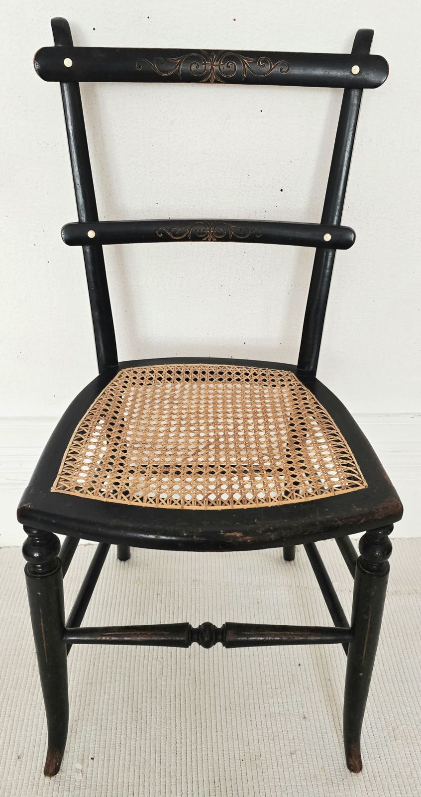 A Victorian Ebonised Salon Chair With Rattan Seat  & Bone Inlay.