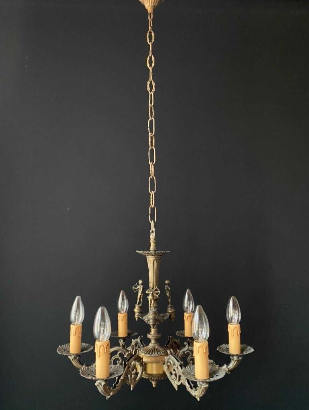 Antieke Messing Kroonluchter met Boogschutters photo furniture
