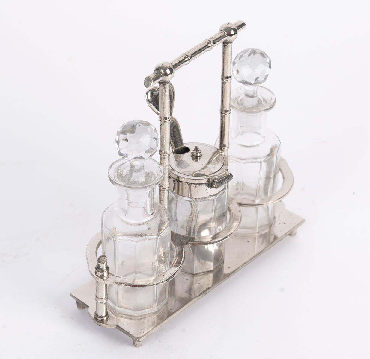 Oil And Vinegar Cruets With A Matching Mustard Jar, Made Of Silver Plated Metal. photo furniture