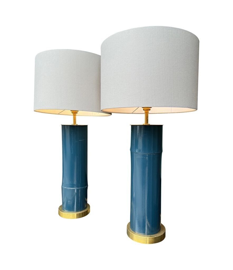 Lighting A Pair Of Petrol Blue Lacquered Bamboo And Brass Lamps photo