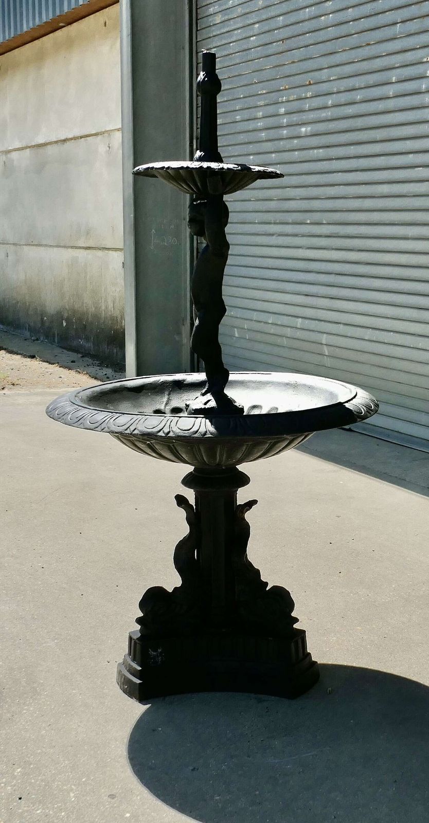 Black Cast Iron Fountain With Cherub Boy A Good Piece In A Classical Style With Dolphins photo for sale