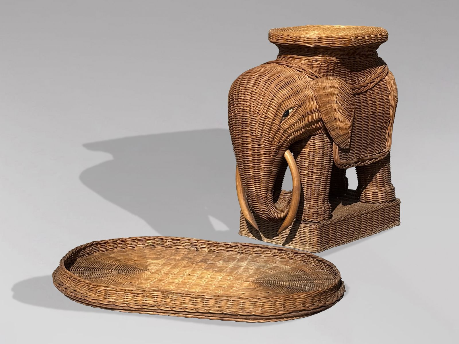 photo furniture 1970s Italian Hand Woven Wicker Elephant Shaped Side Table