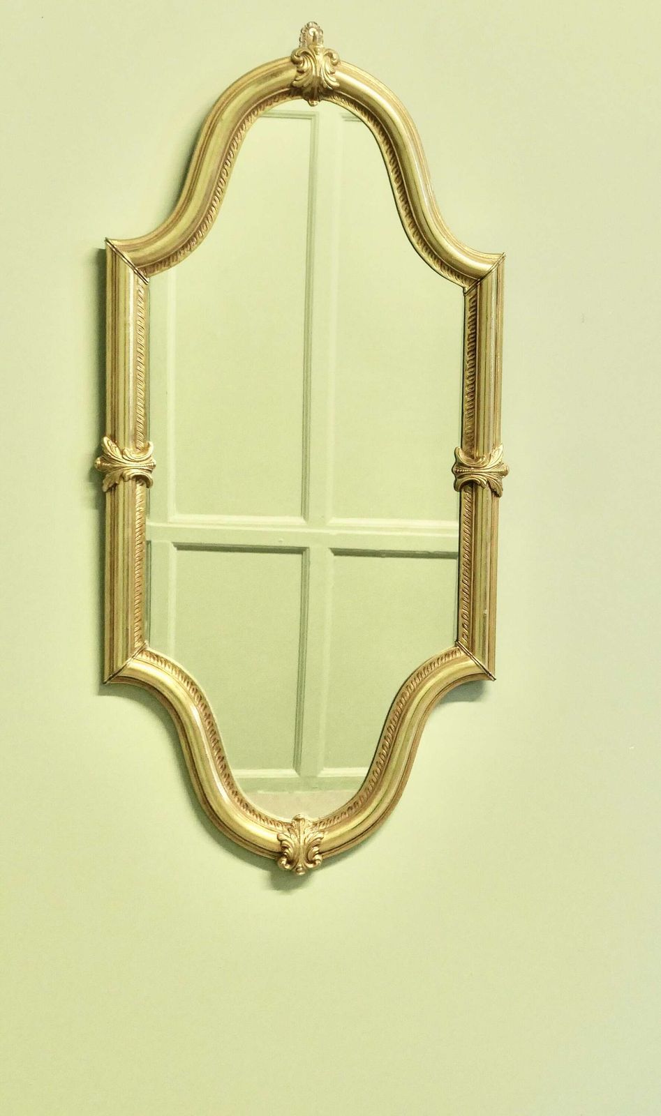 A Long Shaped Oval Brass Wall Mirror The Mirror Has A Decorative Acanthus Leaf Motif Aro