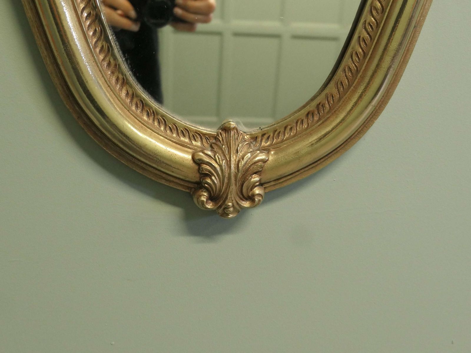 A Long Shaped Oval Brass Wall Mirror The Mirror Has A Decorative Acanthus Leaf Motif Aro photo Home Decor