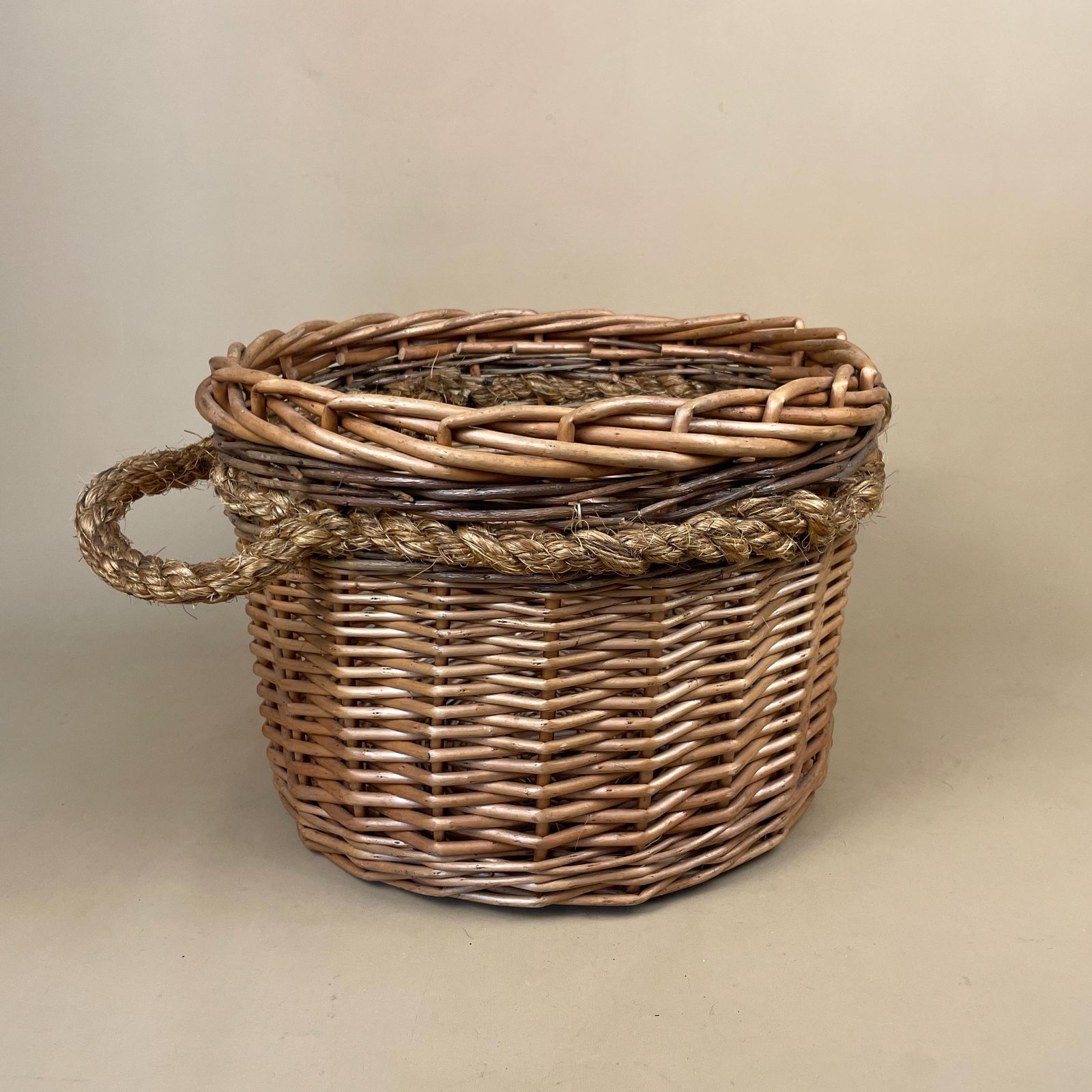 Vintage Round Basket Woven Wicker Brown Antique Cylinder Storage Farmhouse Cottage Decor Laundry Cane Wood Logs Fireplace Rope Handles photo Home Decor