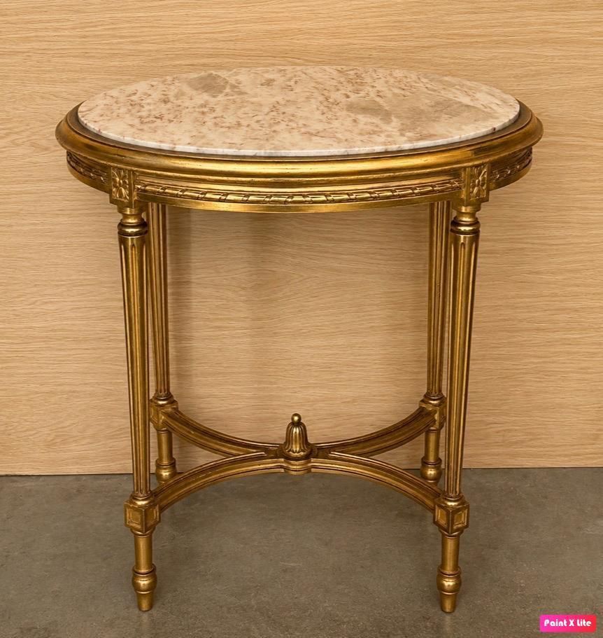 Console ovale dorée de style Louis XVI, à quatre pieds photo Mobilier